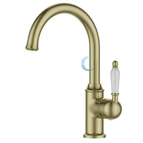 ברז מעוצב לכיור שקוע זהב מט ידית חרס לבנה